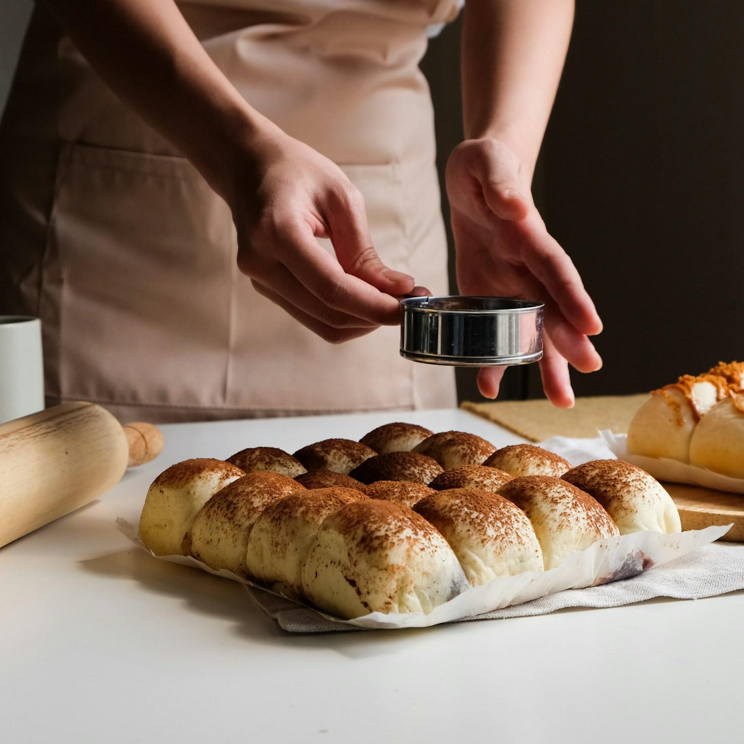 Community members collaborating in a modern kitchen space, sharing recipes and cooking techniques